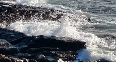 waves on rocks